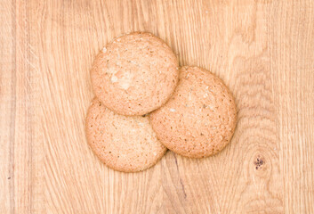 Corn cookies on a wooden background, top-down