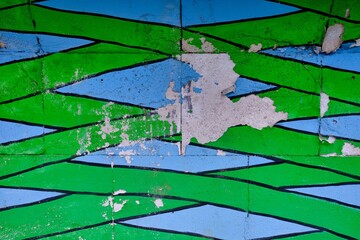 Old paint peeling from wall texture background