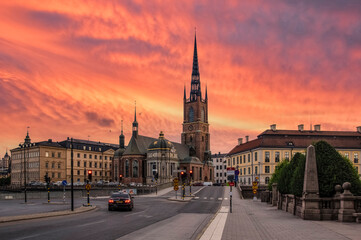 Naklejka premium Church of Santa Clara. Sunset with a bright red sky. Stockholm, Sweden