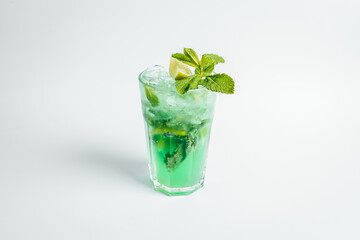 Fresh mojito cocktail in glasses on bright background with lime ant mint lefs, alcoholic cocktail.