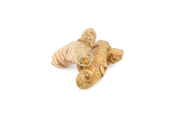 Turmeric spice rhizome isolated on white background. Heap of curcuma longa roots