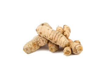 Turmeric spice rhizome isolated on white background. Heap of curcuma longa roots