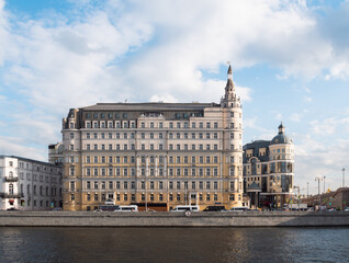 Fototapeta na wymiar Building at embankment of Moscow river at sunny day