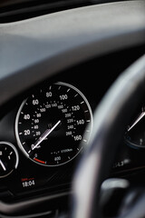 Close up shot of a speedometer in car. 