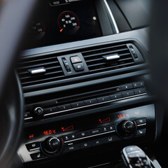 Modern car climate control panel. Zone climate control. Car interior detail. Luxury car Interior.