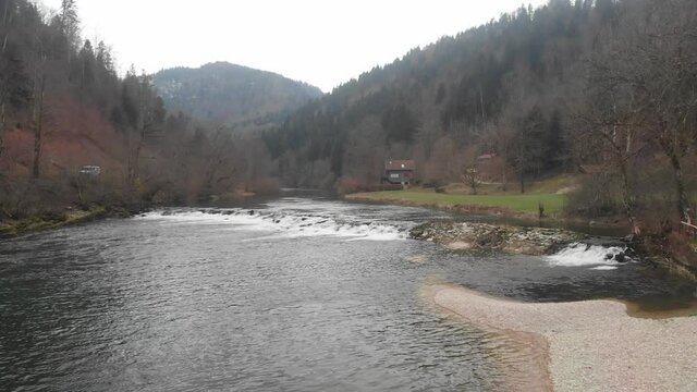 Old weir on the river Doubs in Switzerland