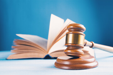 the judge's hammer and the book on the table