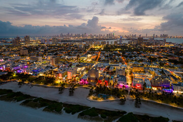 Miami Beach FL lit with neon lights at twilight sunset