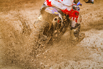 Details of flying debris during an acceleration in motocross race