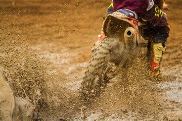 Details of flying debris during an acceleration in motocross race
