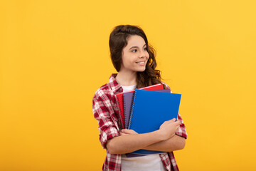 smiling school teen girl ready to study with notebooks, school