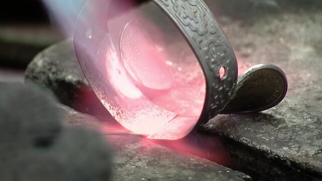 Worker fabricating Yerba Mate Cups decorated with Metal at his Workshop in Buenos Aires, Argentina. Close Up.