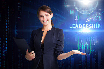 Business, Technology, Internet and network concept. Young businessman working on a virtual screen of the future and sees the inscription: Leadership