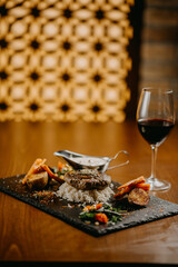 Steak with green butter mushroom sauce and vegetables
