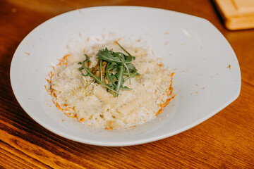 Macaroni and cheese with grated parmesan cheese on top