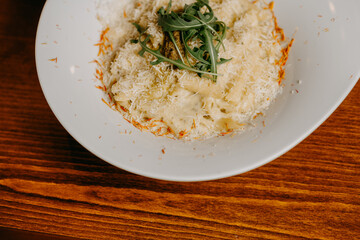 Macaroni and cheese with grated parmesan cheese on top