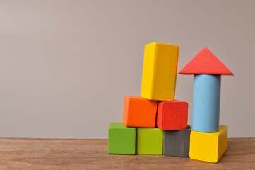 Obraz premium Colorful wooden building blocks with copy space. Selective focus.