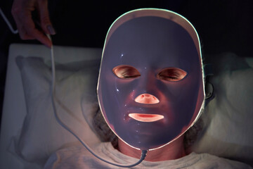photon mask. Health and beauty. Cosmetic procedure for woman face. Beauty laboratory. LED Facial...