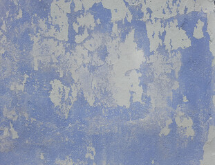 Abstract gray-blue background. A battered wall. It can be used for banners, posters.