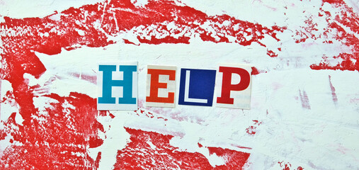 Help headline. Cut out colored letters from magazines and compilation of Help. Psychology, support...