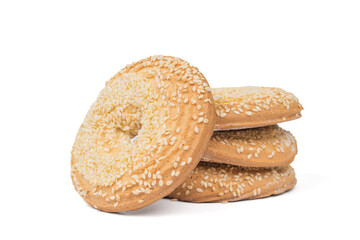 Several round cookies with a hole in the middle isolated on a white background.