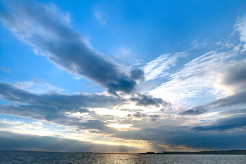 Naklejka premium Sun Setting Over the Sea