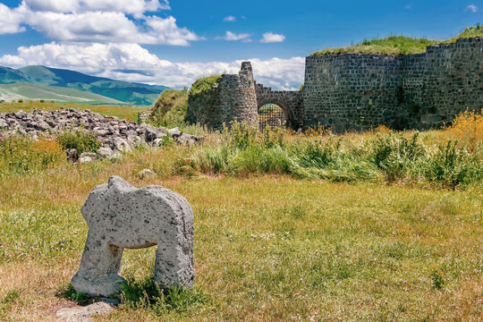 Lori Berd Fortress Gate with Paved Road and Walls on a Cloudy Day