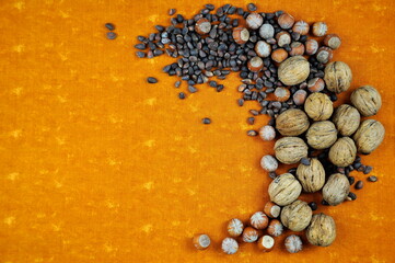 A composition of different nuts on the table. Background image.