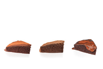 Three slice chocolate cake isolated in white background.