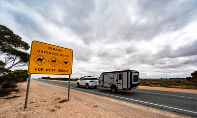 Animal crossing sign near Caiguna on the Eyre Highway on the Nullarbor Plain of Western Australia