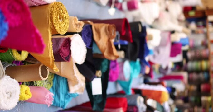 Bolts of wholesale fabric to sew or make quilts with in a craft store