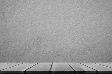 Wooden table counter with cement concrete room background. Interiors old dark texture rough concrete display shelf construction. free space. new design back drop concept.