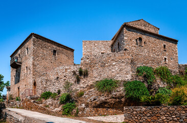 Traditional abandoned houses in Old Kardamili, in Mani, Greece. A typical example of the Maniot vernacular architecture as it developed during the 19th century.