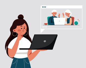 Girl speaks by video link with her grandparents. Elderly couple pensioner parents communicating with daughter by video link at computer with camera