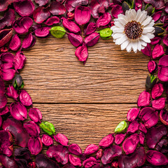 Valentine day, Love symbol, Space with heart shape design from white flowers and pink dried bark from nature on wooden background.