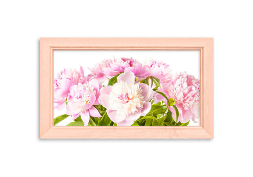 Photo frame with beautiful pink peony flowers picture isolated on white wall