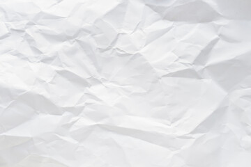 White crumpled paper texture background.