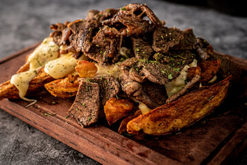 Delicious gajo fries with cheese and beef