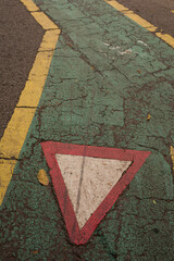 Give way sign on a bicycle lane