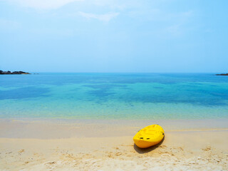Yellow Kayak boat on tropical island beach bright sun in summer. Koh Kood - Thailand