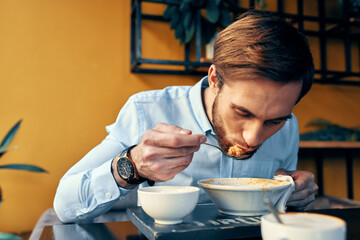 restaurant man soup and various dishes snack at work lunch break