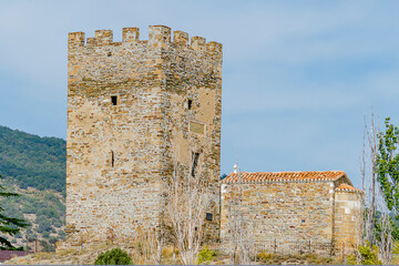 Ancient port tower of Genoese fortress and Church of 12 Apostles