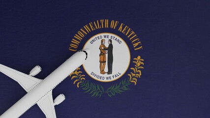 Top Down View of a Plane in the Corner on Top of the US State Flag of Kentucky