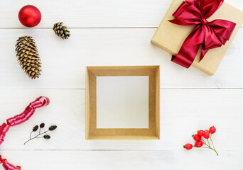 Empty gift box on a wooden table. Horizontal orientation, top view, copy space. 