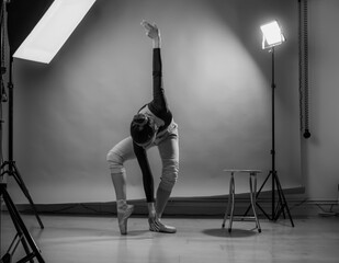 Dancer in a studio combining different types of dance styles. 