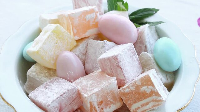 Soft sweets and almond candy in the bowl, lokum, Turkish delights