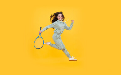 Fototapeta na wymiar happy energetic child jump with squash racket running to success, sport success.
