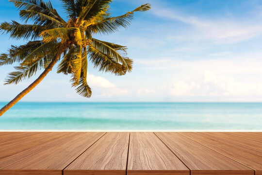 Empty New Wood Table And Sunset Beach With Coconut Palm Tree In Background