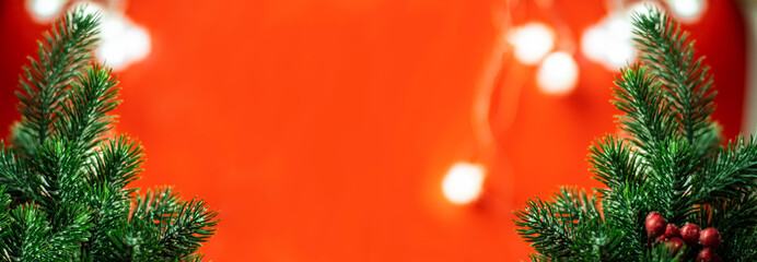 New Year's banner. Green Christmas trees on a red background with space for text