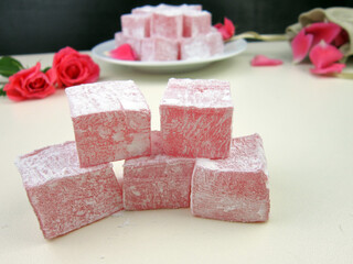 Turkish delight, rose flavored Turkish delight on the plate.